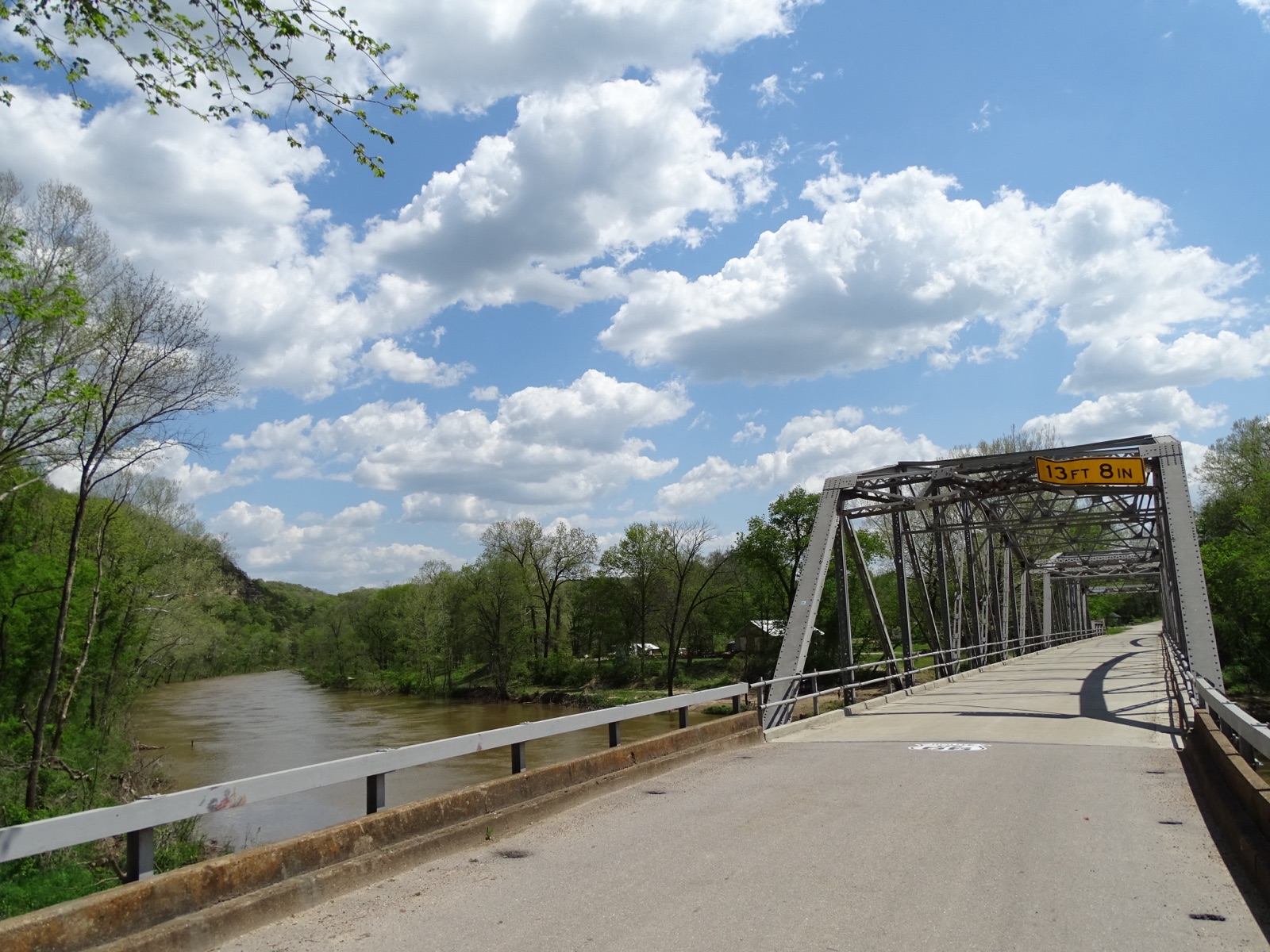 The steel truss Devil's Elbow Bridge over the Big Piney River in Missouri, on a spring day